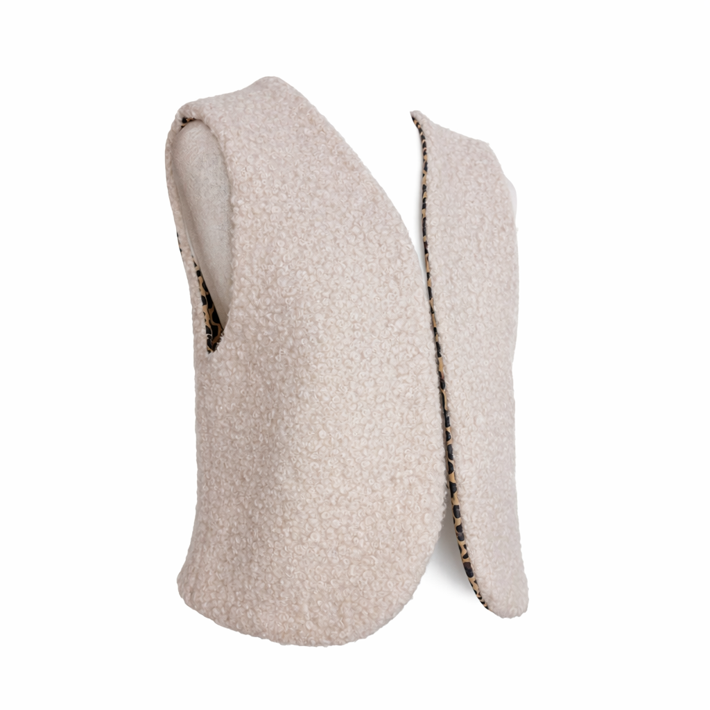 Gilet réversible : molleton léopard et fourrure sherpa